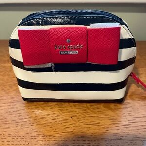 Adorable Kate Spade nautical makeup bag. Never used.